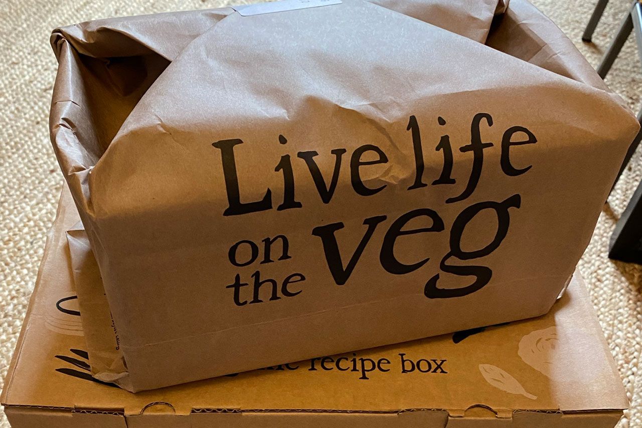 Riverford Organic cardboard and paper packaging, with the slogan 'Live life on the veg.'
